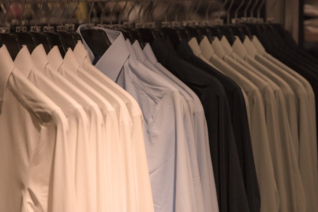 shirts-of-various-colors-hang-on-hangers-zkmohtvgduk